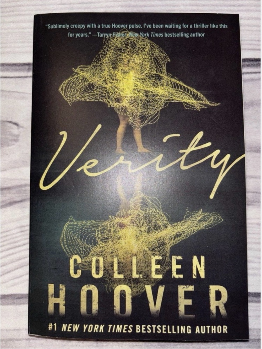 Verity Paperback Book - Black and Yellow Cover